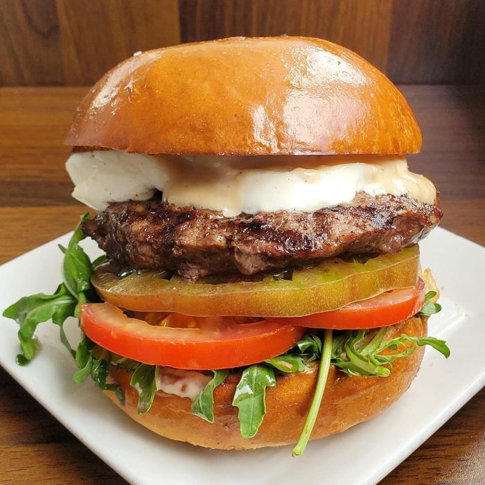 A hamburger from a restaurant in Claremont to eat on your spring break bucket list. 