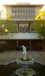 A statue of the goddess Venus in a fountain in the courtyard of a college in Claremont