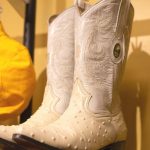 womens cowboy boots displayed at a store.